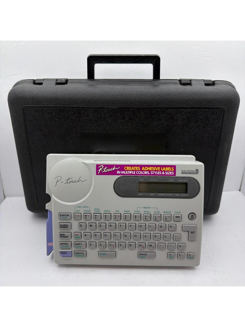 p-touch electronic labeling system model PT-25 W/ Hard Case And Paperwork